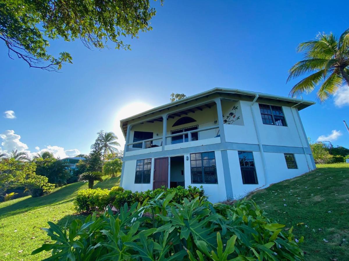 Sea Cliff Eco-Cottages & Gin Distillery Calibishie Екстер'єр фото