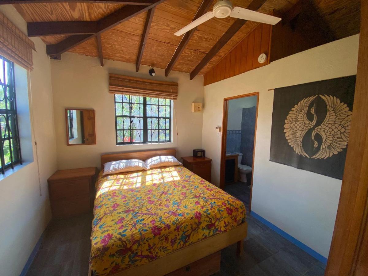 Sea Cliff Eco-Cottages & Gin Distillery Calibishie Екстер'єр фото