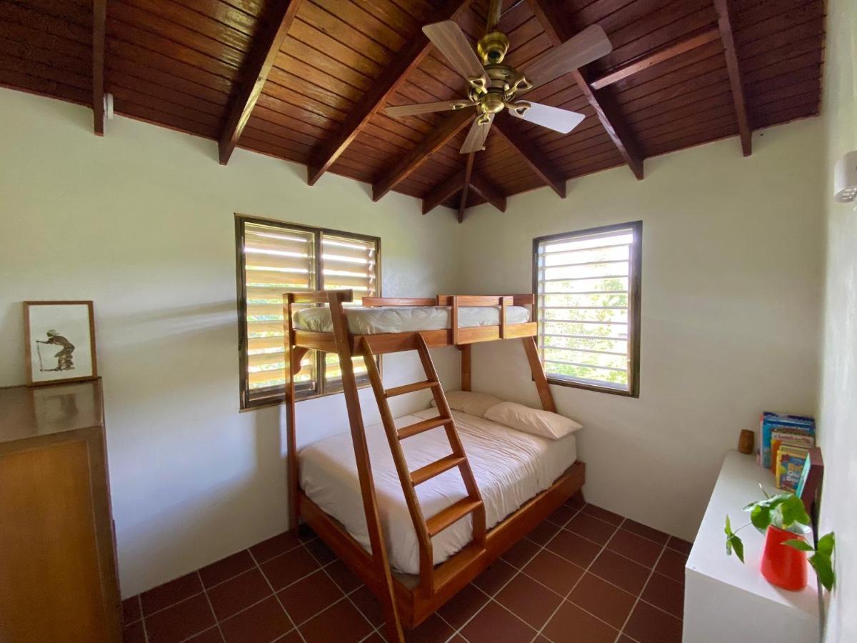 Sea Cliff Eco-Cottages & Gin Distillery Calibishie Екстер'єр фото