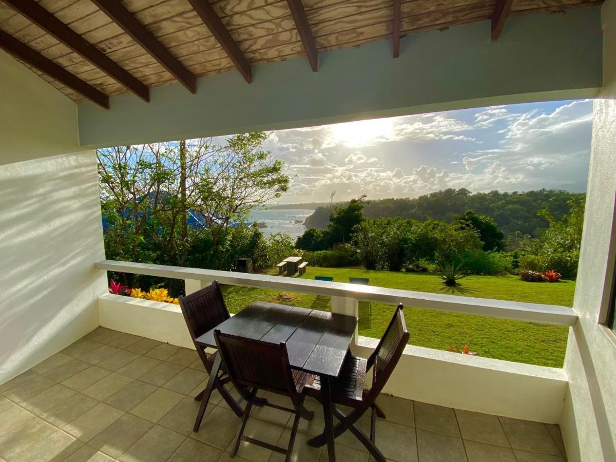 Sea Cliff Eco-Cottages & Gin Distillery Calibishie Екстер'єр фото