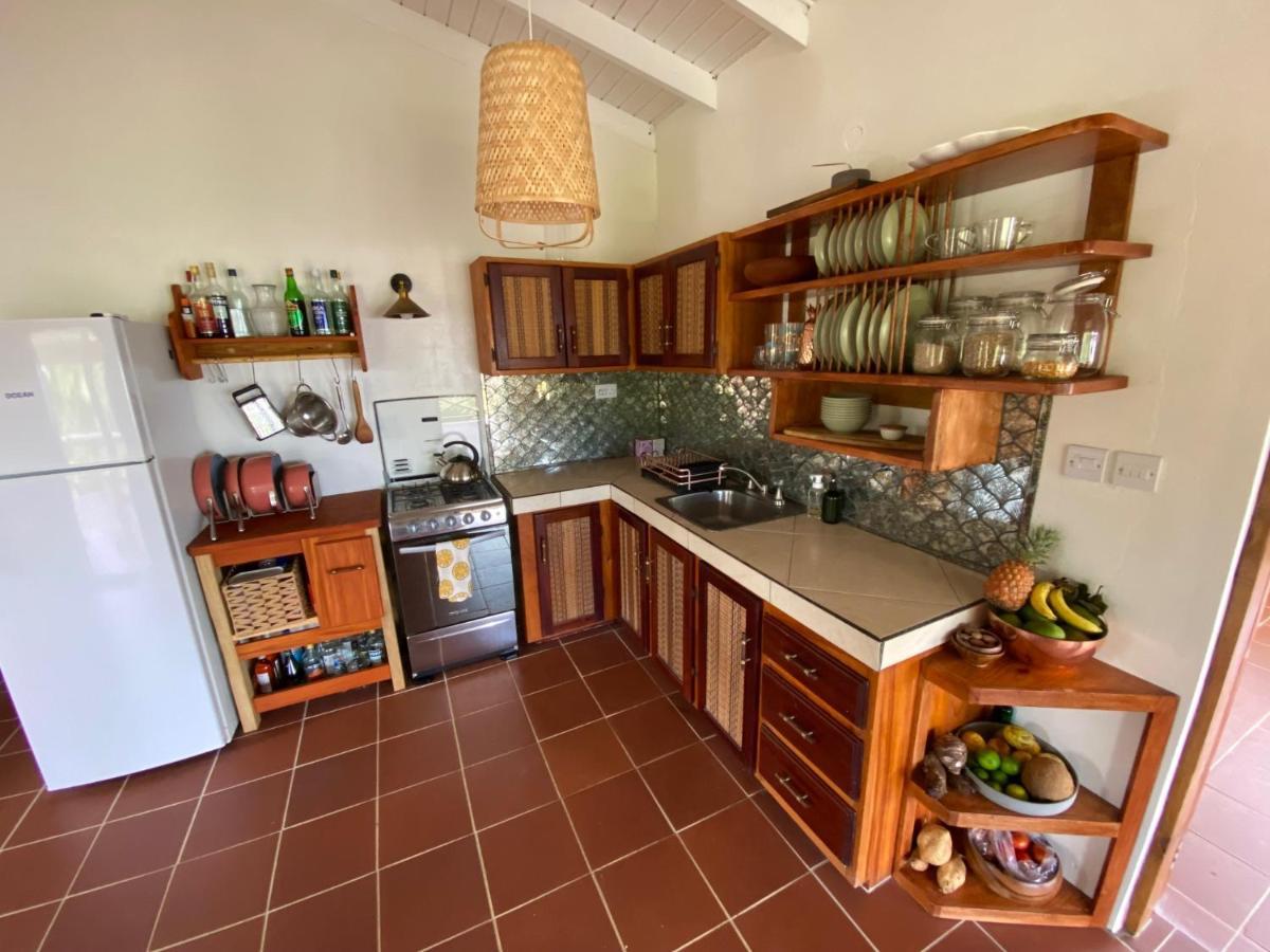 Sea Cliff Eco-Cottages & Gin Distillery Calibishie Екстер'єр фото