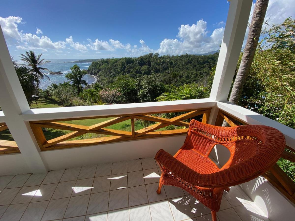 Sea Cliff Eco-Cottages & Gin Distillery Calibishie Екстер'єр фото
