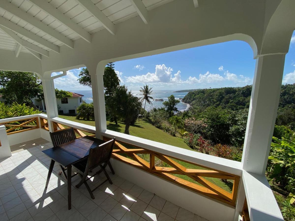 Sea Cliff Eco-Cottages & Gin Distillery Calibishie Екстер'єр фото