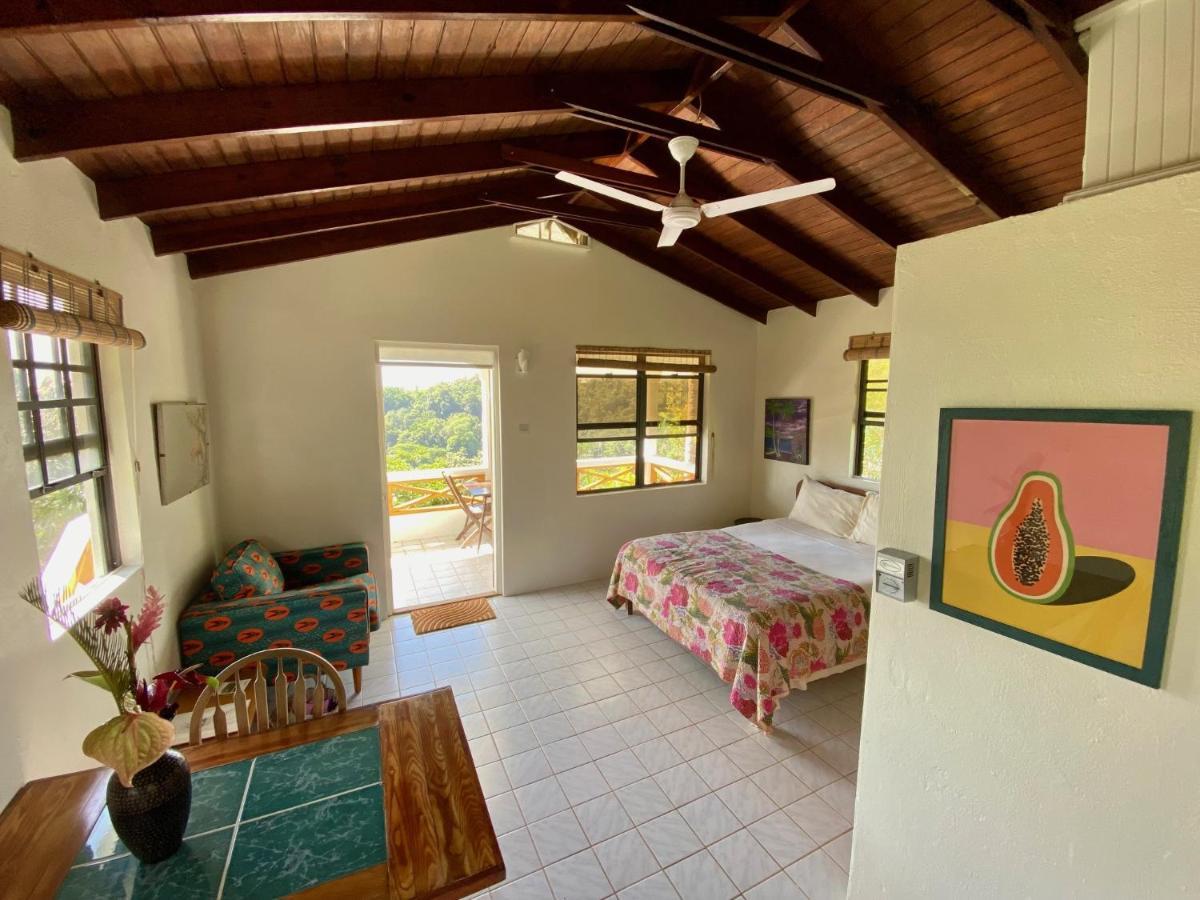 Sea Cliff Eco-Cottages & Gin Distillery Calibishie Екстер'єр фото