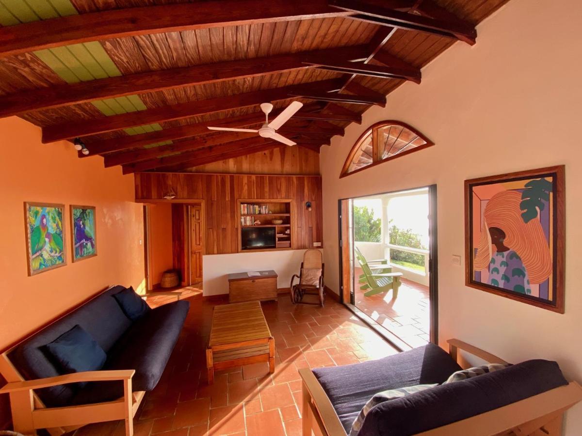 Sea Cliff Eco-Cottages & Gin Distillery Calibishie Екстер'єр фото